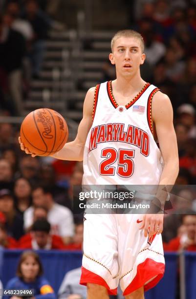 Steve Blake of the Maryland Terrapins dribbles up court during the NCAA College Basketball Tournament 2nd round game against the Wisconsin Badgers at...