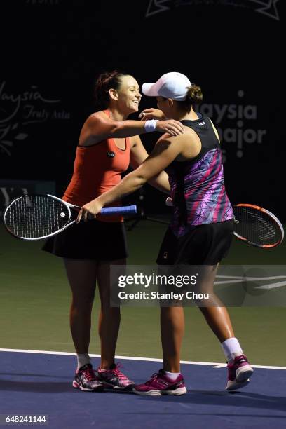 Ashleigh Barty and Casey Dellacqua of Australia celebrates after the Doubles Final during the 2017 WTA Malaysian Open at the TPC on March 5, 2017 in...