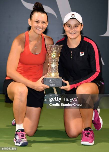 Ashleigh Barty and Casey Dellacqua of Australia poses with the Douubles Champion Trophy after the Doubles Final during the 2017 WTA Malaysian Open at...