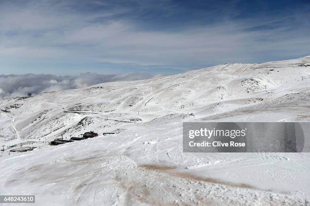 Sand from the Sahara desert which was carried by a recent storm is seen in the discoloured snow throughout the resort ahead of the FIS Freestyle Ski...