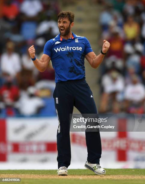 Liam Plunkett of England celebrates dismissing Jonathan Carter of the West Indies during the 2nd One Day International match between the West Indies...