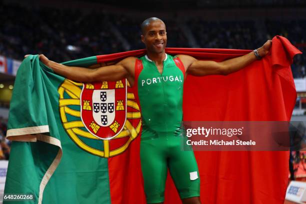 Gold medalist Nelson Evora of Portugal celebrates following the Men's Triple Jump final on day three of the 2017 European Athletics Indoor...