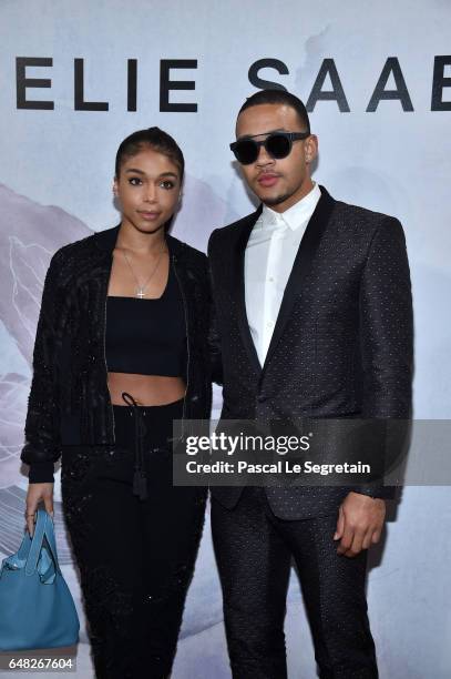 Lori Harvey and Memphis Depay attend the Elie Saab show as part of the Paris Fashion Week Womenswear Fall/Winter 2017/2018 on March 4, 2017 in Paris,...