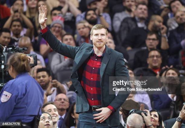 Former player Matt Bonner of the Toronto Raptors is recognized during a break in the action of the game against the Washington Wizards during NBA...