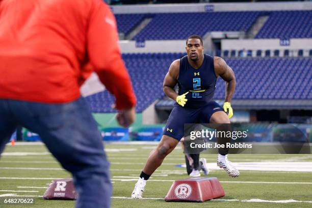 Defensive lineman Jonathan Allen of Alabama participates in a drill during day five of the NFL Combine at Lucas Oil Stadium on March 5, 2017 in...