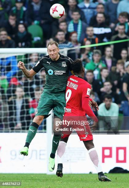 Andreas Granqvist of FC Krasnodar is challenged by Ze Luis of FC Spartak Moscow during the Russian Premier League match between FC Krasnodar v FC...