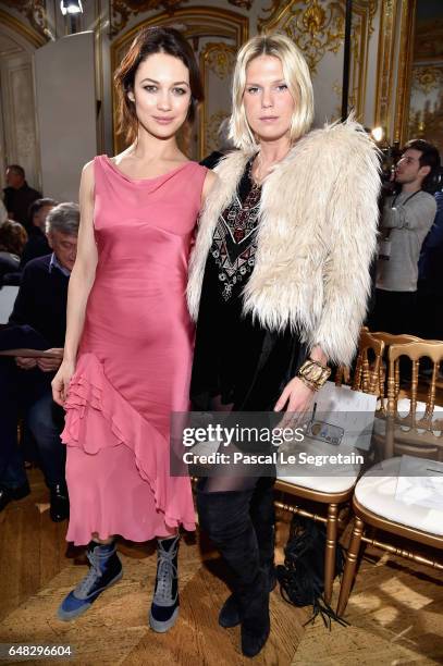 Olga Kurylenko and Alexandra Richards attend the John Galliano show as part of the Paris Fashion Week Womenswear Fall/Winter 2017/2018 on March 5,...