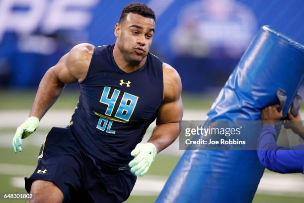 Defensive lineman Solomon Thomas of Stanford participates in a drill during day five of the NFL Combine at Lucas Oil Stadium on March 5, 2017 in...