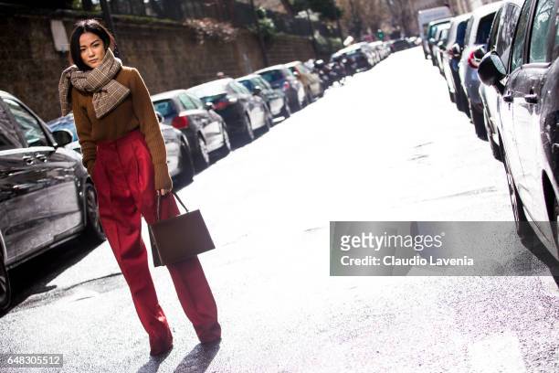 Yoyo Cao is seen in the streets of Paris before the Valentino show during Paris Fashion Week Womenswear Fall/Winter 2017/2018 on March 5, 2017 in...