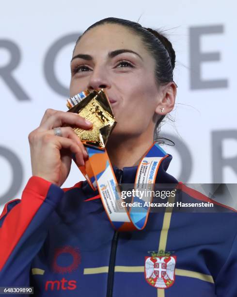 Gold medalist Ivana Spanovic of Serbia poses during the medal ceremony for the Women's Long Jump on day three of the 2017 European Athletics Indoor...