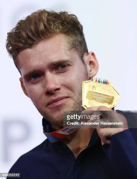Gold medalist Kevin Mayer of France poses during the medal ceremony for the Men's Heptathlon on day three of the 2017 European Athletics Indoor...