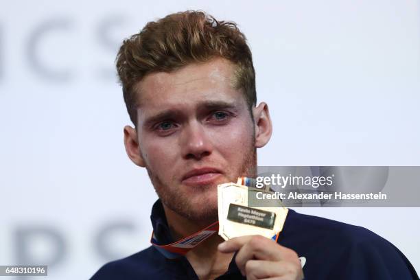 Gold medalist Kevin Mayer of France poses during the medal ceremony for the Men's Heptathlon on day three of the 2017 European Athletics Indoor...