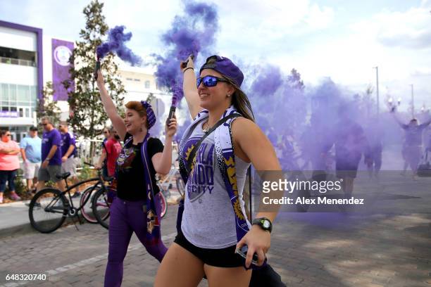 Members of the Orlando Ruckus march to the stadium prior to a MLS soccer match between New York City FC and Orlando City SC at the Orlando City...