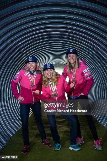 Team USA Medal winners Kikkan Randall, Jessica Diggins and Sadie Bjornsen pose for a portrait with their medals at the FIS Nordic World Ski...