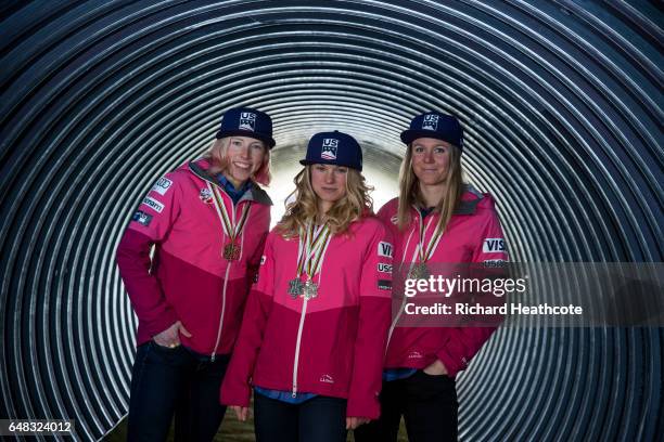 Team USA Medal winners Kikkan Randall, Jessica Diggins and Sadie Bjornsen pose for a portrait with their medals at the FIS Nordic World Ski...