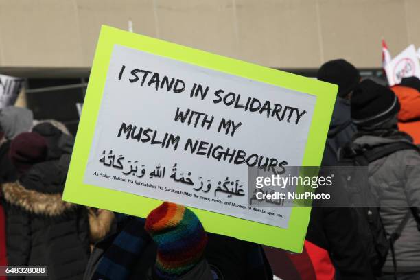 Pro-Muslim demonstrators hold a counter-protest against anti-Muslim groups over the M-103 motion to fight Islamophobia during pro-Muslim and...