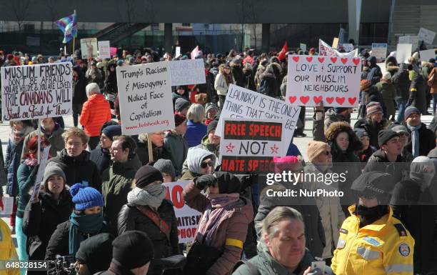 Pro-Muslim demonstrators hold a counter-protest against anti-Muslim groups over the M-103 motion to fight Islamophobia in downtown Toronto, Ontario,...