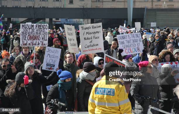 Pro-Muslim demonstrators hold a counter-protest against anti-Muslim groups over the M-103 motion to fight Islamophobia in downtown Toronto, Ontario,...