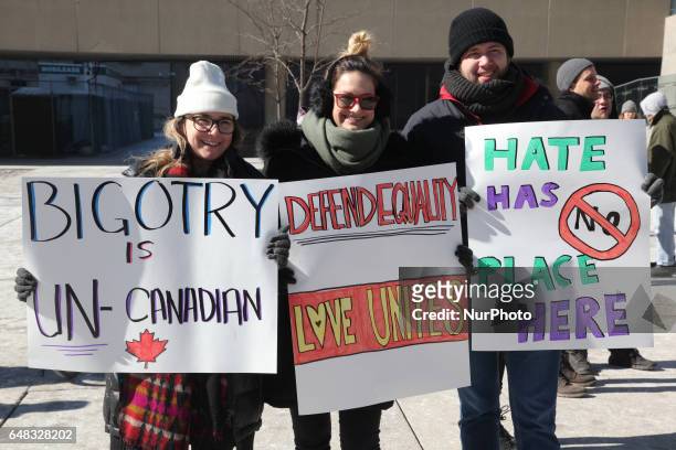 Pro-Muslim demonstrators hold a counter-protest against anti-Muslim groups over the M-103 motion to fight Islamophobia in downtown Toronto, Ontario,...