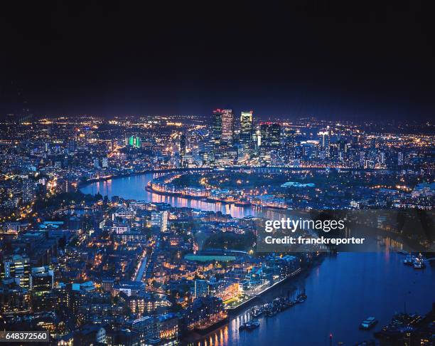 canary whard skyline at night - london aerial view stock pictures, royalty-free photos & images