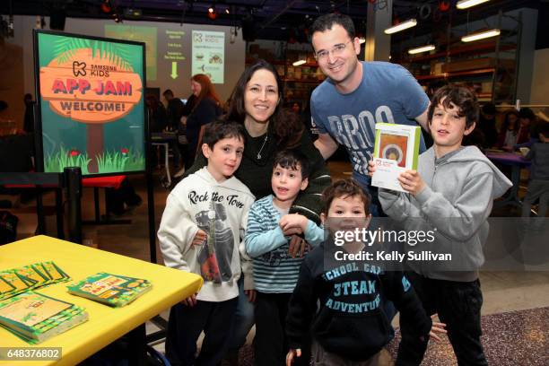 Raffle-winning family shows off their new Samsung Galaxy Tab E Lite during the Samsung Kids App Jam event at the Tech Museum of Innovation on March...