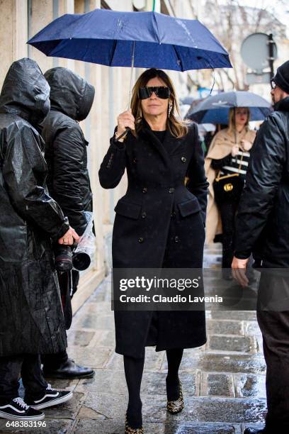 Carine Roitfeld is seen in the streets of Paris before the Valentino show during Paris Fashion Week Womenswear Fall/Winter 2017/2018 on March 5, 2017...