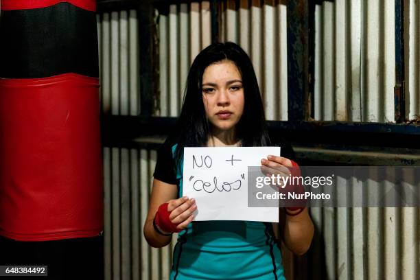 Osorno, Chile. The amateur boxer Javiera Paz González, 17 years old and belonging to the Boxing School Carlos &quot;Látigo&quot; Uribe poses with a...