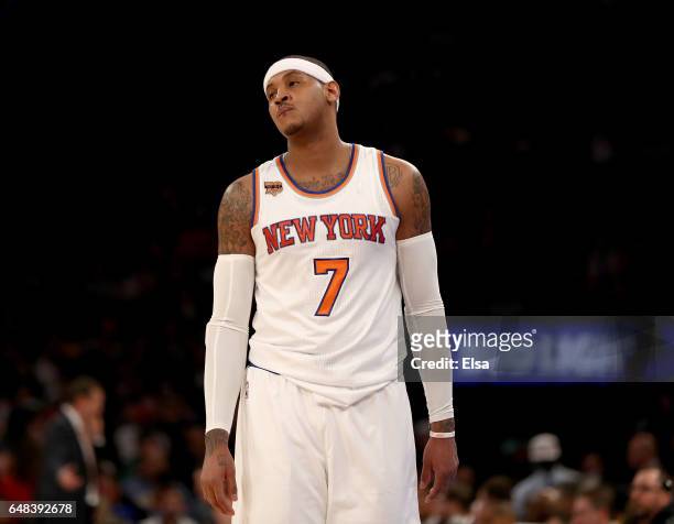 Carmelo Anthony of the New York Knicks reacts in the fourth quarter against the Golden State Warriors at Madison Square Garden on March 5, 2017 in...