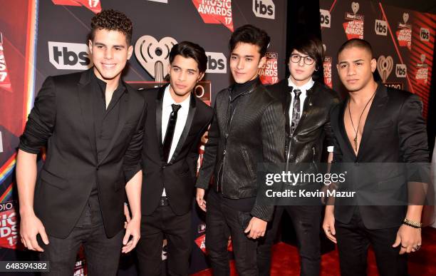 Singers Zabdiel de Jesus, Erick Brian Colon, Christopher Velez and Richard Camacho of CNCO attend the 2017 iHeartRadio Music Awards which broadcast...