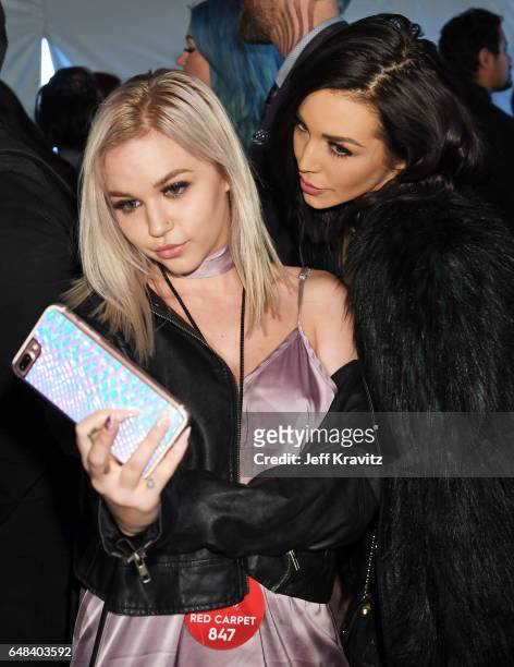 Cortney Van Olphen and TV personality Scheana Marie attend the 2017 iHeartRadio Music Awards which broadcast live on Turner's TBS, TNT, and truTV at...