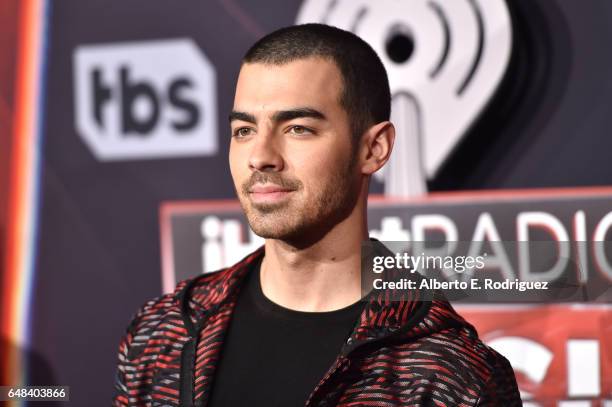 Singer Joe Jonas of music group DNCE attends the 2017 iHeartRadio Music Awards which broadcast live on Turner's TBS, TNT, and truTV at The Forum on...
