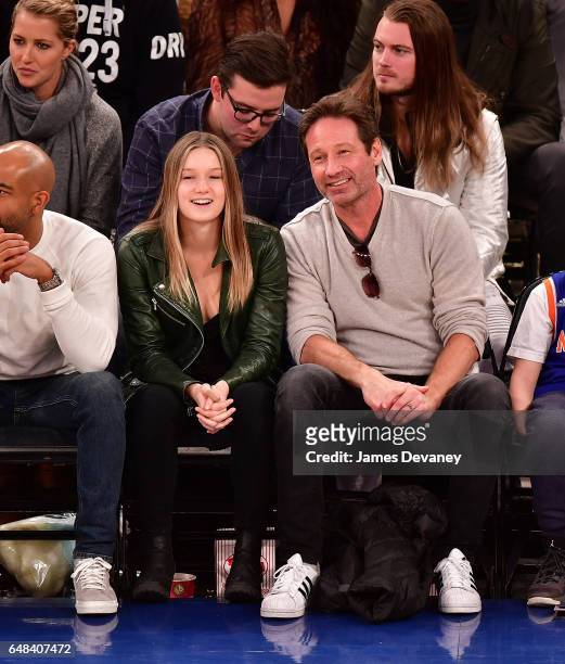 Madelaine Duchovny and David Duchnovy attend Golden State Warriors Vs. New York Knicks game at Madison Square Garden on March 5, 2017 in New York...
