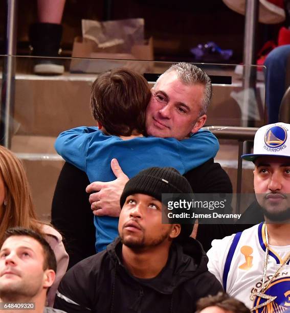 Shane McMahon and son Rogan McMahon attend Golden State Warriors Vs. New York Knicks game at Madison Square Garden on March 5, 2017 in New York City.