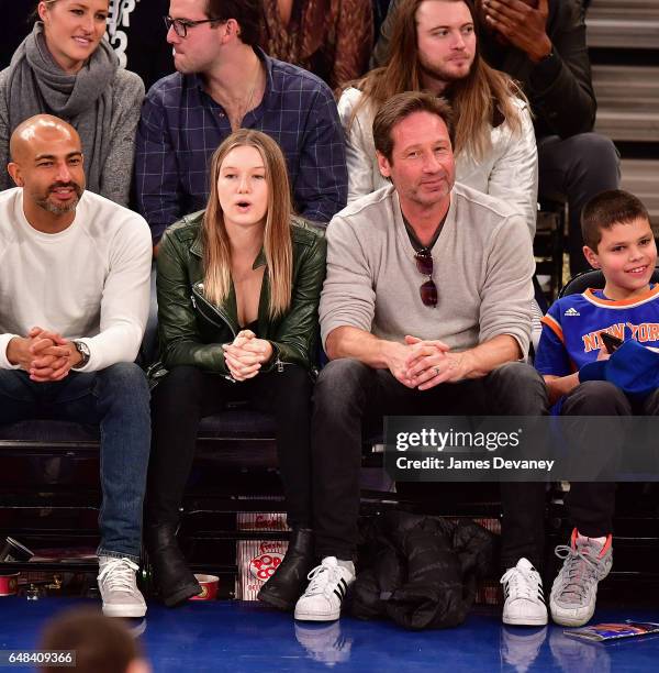 Madelaine Duchovny and David Duchnovy attend Golden State Warriors Vs. New York Knicks game at Madison Square Garden on March 5, 2017 in New York...