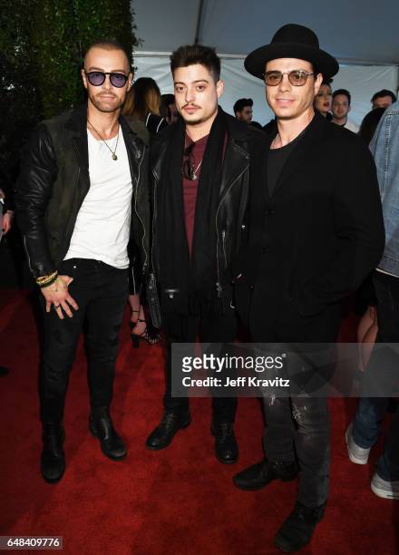 Musicians Joey Lawrence, Andrew Lawrence, and Matthew Lawrence of The Lawrence Brothers attends the 2017 iHeartRadio Music Awards which broadcast...