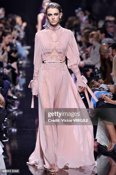 Model walks the runway during the Elie Saab Ready to Wear fashion show as part of the Paris Fashion Week Womenswear Fall/Winter 2017/2018 on March 4,...