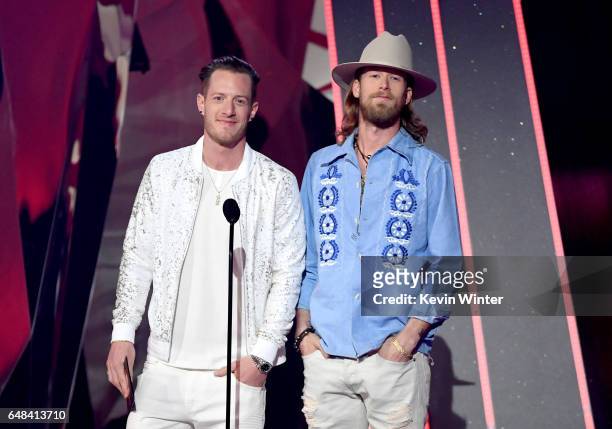 Musicians Tyler Hubbard and Brian Kelley of Florida Georgia Line speak onstage at the 2017 iHeartRadio Music Awards which broadcast live on Turner's...