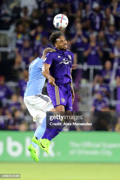 Giles Barnes of Orlando City SC and Alexander Ring of New York City FC fight for the ball during a MLS soccer match between New York City FC and...