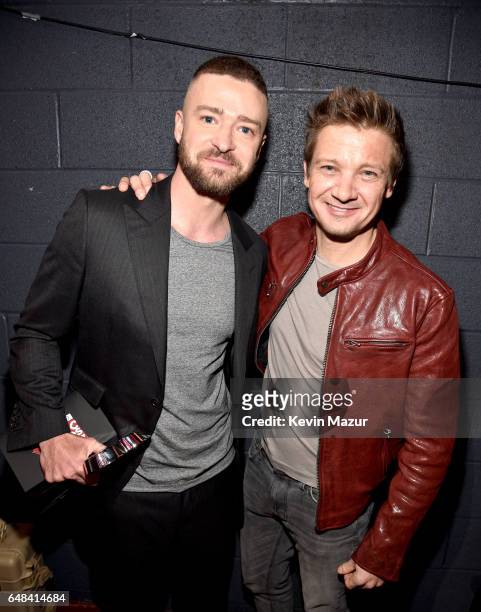 Singer Justin Timberlake and actor Jeremy Renner pose with the Song of the Year award for 'Can't Stop The Feeling' at the 2017 iHeartRadio Music...