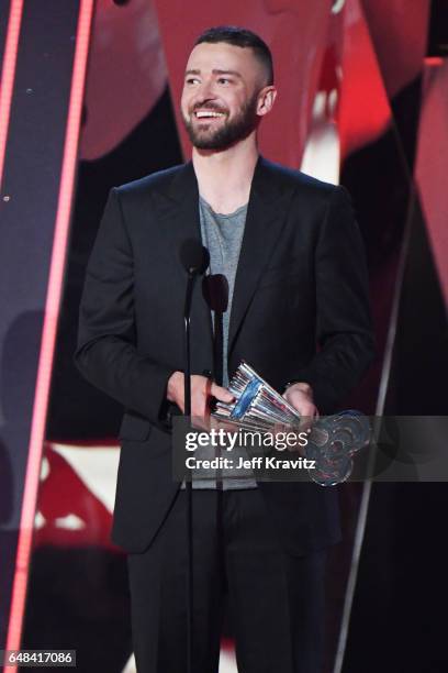 Entertainer Justin Timberlake accepts the award for Song of the Year for 'Can't Stop the Feeling' onstage at the 2017 iHeartRadio Music Awards which...