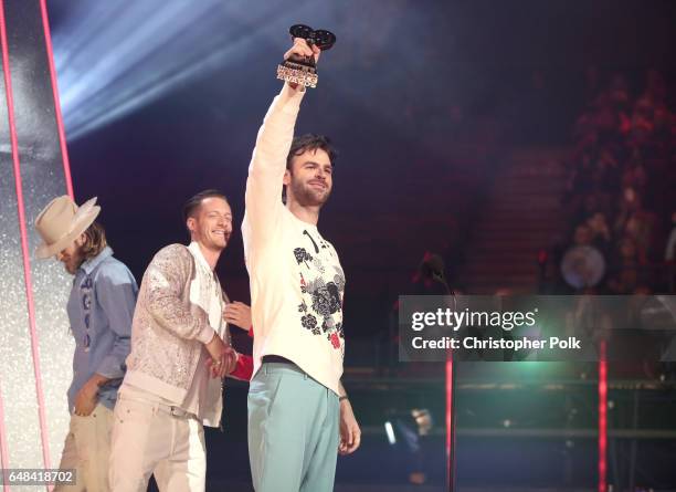 Singers-songwriters Brian Kelley and Tyler Hubbard of music group Florida Georgia Line present the Brand New Artist award to recording artist Alex...