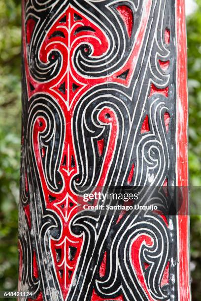colorful pattern on a column - samosir island stock pictures, royalty-free photos & images