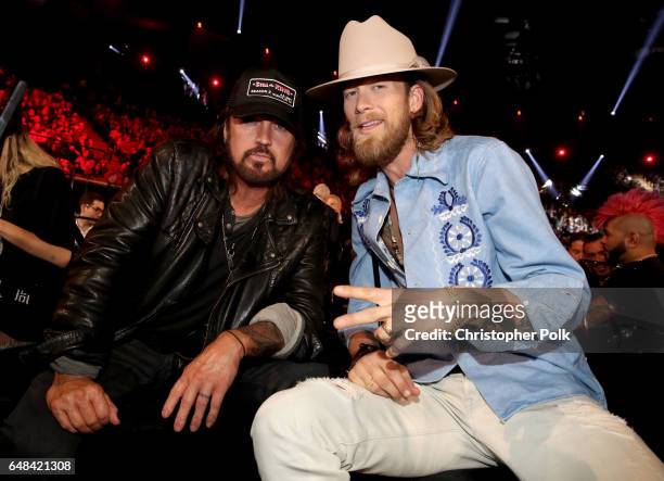 Singer-songwriter Billy Ray Cyrus and singer-songwriter Brian Kelley of music group Florida Georgia Line pose during the 2017 iHeartRadio Music...