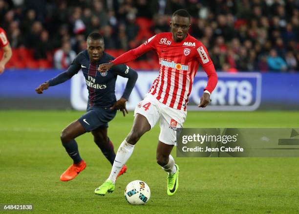 Modou Diagne of Nancy and Blaise Matuidi of PSG in action during the French Ligue 1 match between Paris Saint Germain and AS Nancy Lorraine at Parc...