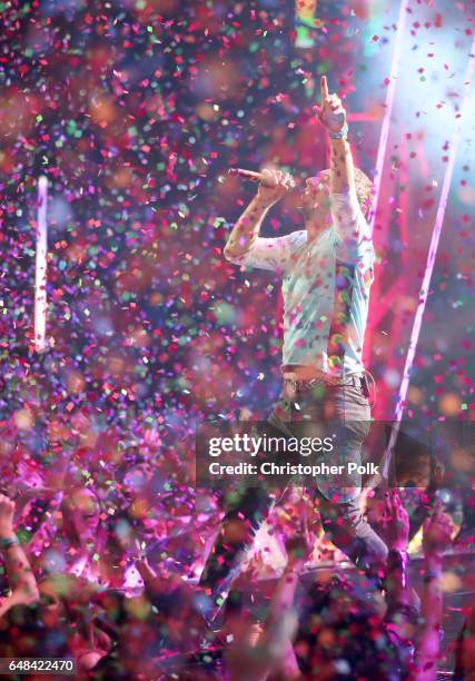Musician Chris Martin performs onstage at the 2017 iHeartRadio Music Awards which broadcast live on Turner's TBS, TNT, and truTV at The Forum on...