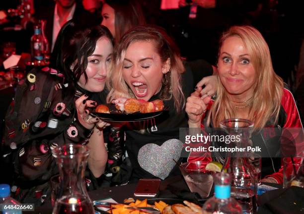 Singers-songwriters Noah Cyrus and Miley Cyrus, and Tish Cyrus attend the 2017 iHeartRadio Music Awards which broadcast live on Turner's TBS, TNT,...