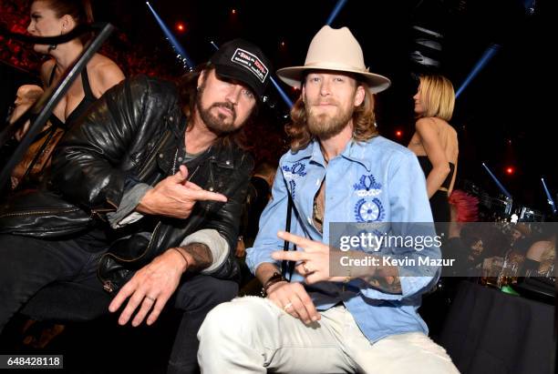 Singer-songwriters Billy Ray Cyrus and Brian Kelley of Florida Georgia Line attend the 2017 iHeartRadio Music Awards which broadcast live on Turner's...