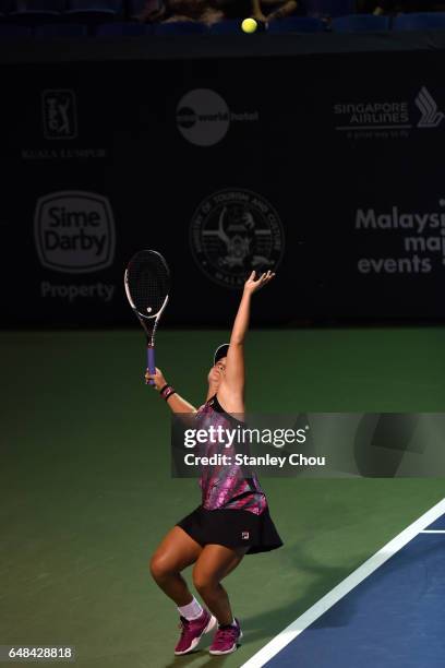 Ashleigh Barty of Australia serves to Nao Hibino of Japan during the Final of the 2017 WTA Malaysian Open at the TPC on March 5, 2017 in Kuala...