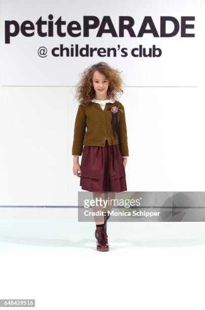 Model walks the runway during #SEN show during petitePARADE at Children's Club at Jacob Javitz Center on March 5, 2017 in New York City.