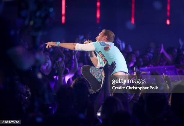 Musician Chris Martin performs onstage at the 2017 iHeartRadio Music Awards which broadcast live on Turner's TBS, TNT, and truTV at The Forum on...